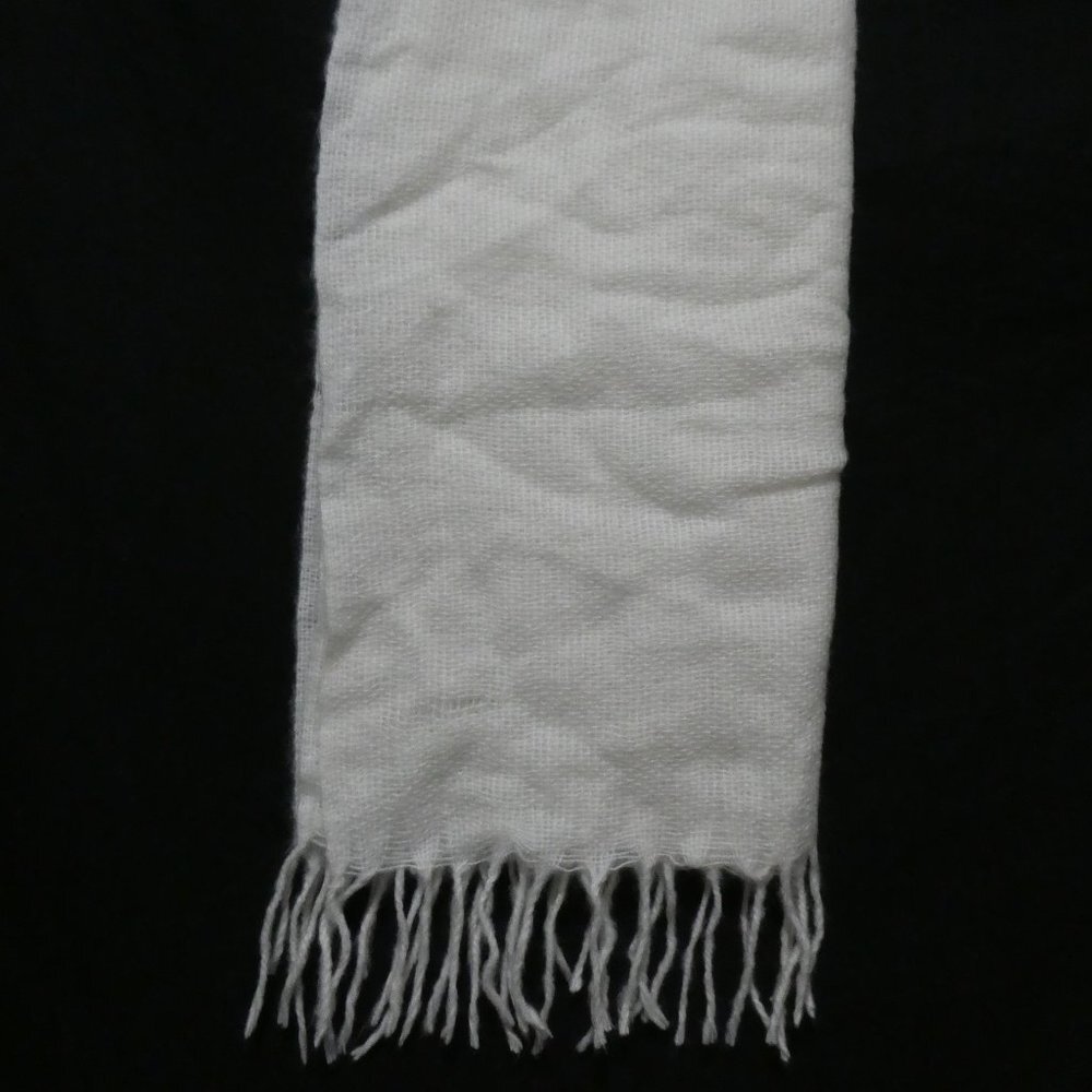 White, light, loose knit scarf with tassels